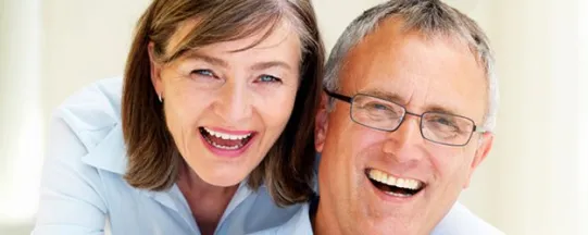Man and woman laughing